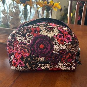 Vera Bradley Risewood print cosmetic bag with plastic liner.